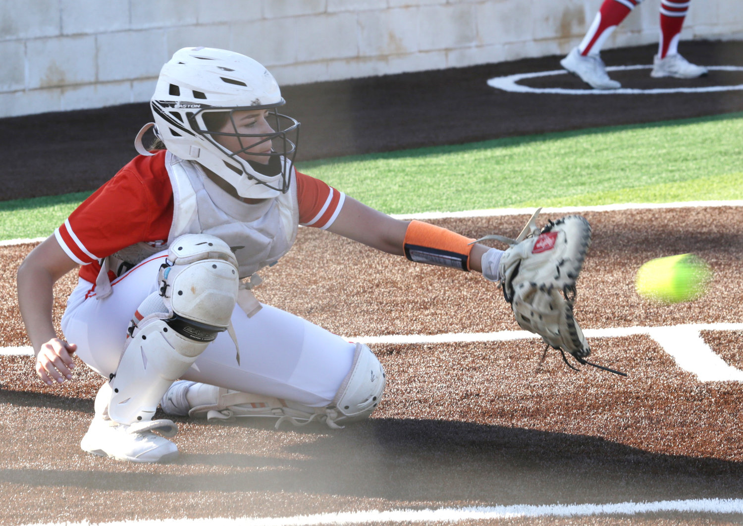 Lady Jacket catcher Jaycee Smith continued her excellent season behind the plate and gunned down a Lady Raider attempting to steal second base last Friday. Here she takes a well-placed pitch from Mineola starter Jadelyn Marshall.